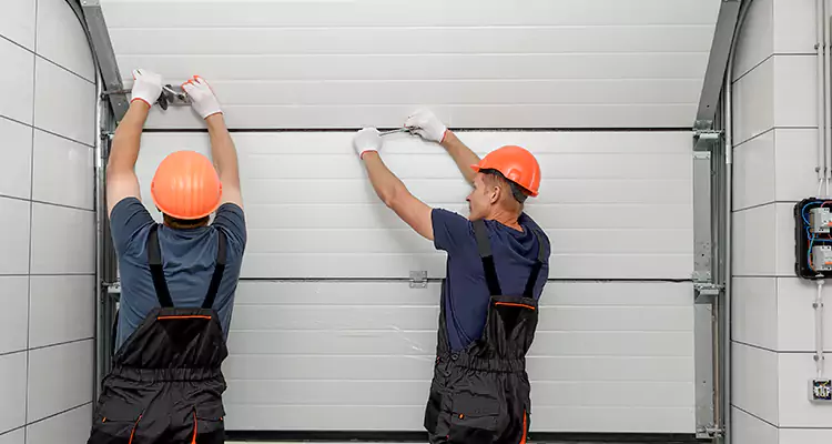 Garage Door Bottom Panel Repair in Riviera Beach, FL